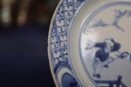 A Chinese blue and white boy and lady dish, Kangxi, with stand diameter 10cm